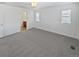 Spacious bedroom with carpet and access to bathroom at 25643 E Bayaud Ave, Aurora, CO 80018