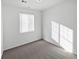 Small bedroom with grey carpet and window blinds at 25643 E Bayaud Ave, Aurora, CO 80018