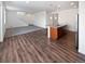 Open kitchen with island and stainless steel appliances at 25643 E Bayaud Ave, Aurora, CO 80018