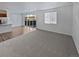 Open concept living room and kitchen with hardwood floors at 25643 E Bayaud Ave, Aurora, CO 80018