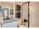 Modern bathroom featuring a walk-in shower, elegant vanity, and decorative wall art at 2536 Wesley Ln, Lafayette, CO 80026