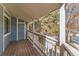 Private deck with treetop views and access to a storage unit at 8335 Fairmount Dr # 3-201, Denver, CO 80247