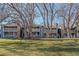 Attractive exterior of a two-story building with landscaping at 8335 Fairmount Dr # 3-201, Denver, CO 80247