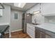 Galley kitchen with stainless steel appliances at 8335 Fairmount Dr # 3-201, Denver, CO 80247