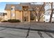 Attractive exterior elevation with street view, landscaping and parking at 7335 E Quincy Ave # 104, Denver, CO 80237