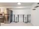 Eat-in kitchen featuring stainless steel refrigerator and seating at bar at 7335 E Quincy Ave # 104, Denver, CO 80237