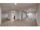 Spacious basement with tile flooring and white walls at 3906 S Quemoy Ct, Aurora, CO 80018