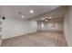 Expansive finished basement featuring carpet flooring and recessed lighting at 3906 S Quemoy Ct, Aurora, CO 80018