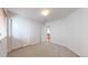 Bedroom with double closet doors, neutral paint, and carpet at 3906 S Quemoy Ct, Aurora, CO 80018