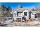 House with large backyard, deck, and stone retaining walls at 60 Golden Eagle Rd, Greenwood Village, CO 80121