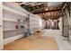 Unfinished basement with ample storage shelving and space at 60 Golden Eagle Rd, Greenwood Village, CO 80121