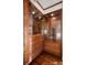 Spacious built-in corner cabinet with glass doors and drawers at 60 Golden Eagle Rd, Greenwood Village, CO 80121