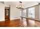 Elegant dining room featuring hardwood floors and a built-in cabinet at 60 Golden Eagle Rd, Greenwood Village, CO 80121