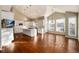 Modern kitchen with white cabinets, island, and high ceilings at 60 Golden Eagle Rd, Greenwood Village, CO 80121