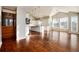 Open concept kitchen with white cabinets and an island at 60 Golden Eagle Rd, Greenwood Village, CO 80121