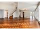 Bright and airy living room with hardwood floors and large windows at 60 Golden Eagle Rd, Greenwood Village, CO 80121