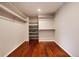 Large walk-in closet with ample shelving and hanging space at 60 Golden Eagle Rd, Greenwood Village, CO 80121