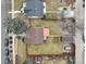 Overhead aerial view shows roof, fenced yard, landscaping, and nearby street at 4850 E 18Th Ave, Denver, CO 80220