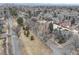 Distant aerial view of the neighborhood with tree-lined streets and varied housing at 4850 E 18Th Ave, Denver, CO 80220