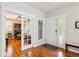 Welcoming foyer with hardwood floors leading into the living room and office at 2723 Galena St, Denver, CO 80238