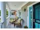 Relaxing front porch with seating, perfect for enjoying the outdoors at 2723 Galena St, Denver, CO 80238