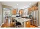 Bright kitchen featuring granite countertops, stainless steel appliances, and an open layout perfect for entertaining at 2723 Galena St, Denver, CO 80238
