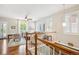 Inviting living room with hardwood floors, neutral tones, and bright natural light from large windows at 2723 Galena St, Denver, CO 80238