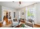 Cozy living room with hardwood floors, natural light, and a view of the office at 2723 Galena St, Denver, CO 80238
