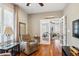 Comfortable office space with hardwood floors, recliner seating, and natural light at 2723 Galena St, Denver, CO 80238