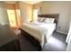 Bedroom featuring a large bed, neutral walls, and natural light at 7429 S Alkire St # 205, Littleton, CO 80127