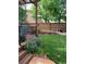 Backyard featuring a deck with metal railings and a mix of stone and grass landscaping at 9807 Arthur Ln, Highlands Ranch, CO 80130