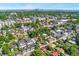 Charming neighborhood aerial view with mature trees and Denver skyline in the background at 4461 Vrain St, Denver, CO 80212