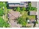 Aerial view of the property highlighting the roof, backyard with stone patio and detached garage at 4461 Vrain St, Denver, CO 80212