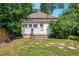 Charming house with small backyard and mature trees at 4461 Vrain St, Denver, CO 80212