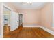 Bedroom with hardwood floors and access to closet at 4461 Vrain St, Denver, CO 80212