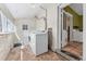 Laundry room with washer, dryer, and natural light at 4461 Vrain St, Denver, CO 80212