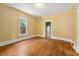 Living room featuring hardwood floors, natural light, and neutral color palette at 4461 Vrain St, Denver, CO 80212