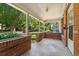 View of a spacious front porch with brick accents and a view of the street at 4461 Vrain St, Denver, CO 80212