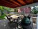 Relaxing backyard deck with seating area, covered patio, and grill at 9336 Pierce St, Westminster, CO 80021