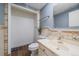 Clean bathroom with updated vanity, tiled floors and walls at 9336 Pierce St, Westminster, CO 80021