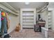 Spacious walk-in closet with built-in shelving and hanging rods at 9336 Pierce St, Westminster, CO 80021