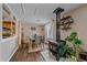 Charming dining room with a wood-burning stove and adjacent kitchen at 9336 Pierce St, Westminster, CO 80021