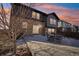 Backyard patio features stone and siding exterior and outdoor seating at 25123 E 5Th Ave, Aurora, CO 80018