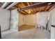 Unfinished basement with vapor barrier on the walls and a concrete floor at 25123 E 5Th Ave, Aurora, CO 80018