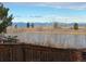 Scenic view from backyard, overlooking pond and mountains at 25123 E 5Th Ave, Aurora, CO 80018