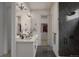 Bathroom with double vanity, walk-in shower, and marble countertops at 2165 Grayside Cir, Castle Rock, CO 80109