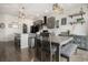 Bright and open floor plan featuring a modern kitchen, dining area, and stylish accents at 26787 E Maple Ave, Aurora, CO 80018