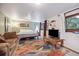 Cozy bedroom featuring a couch and neutral decor at 12173 W 27Th Dr, Lakewood, CO 80215