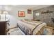 Bedroom with wood floors, moody accents and a large dresser at 12173 W 27Th Dr, Lakewood, CO 80215