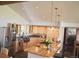 Spacious kitchen featuring ample cabinet space, a unique copper sink, and a large island at 12173 W 27Th Dr, Lakewood, CO 80215